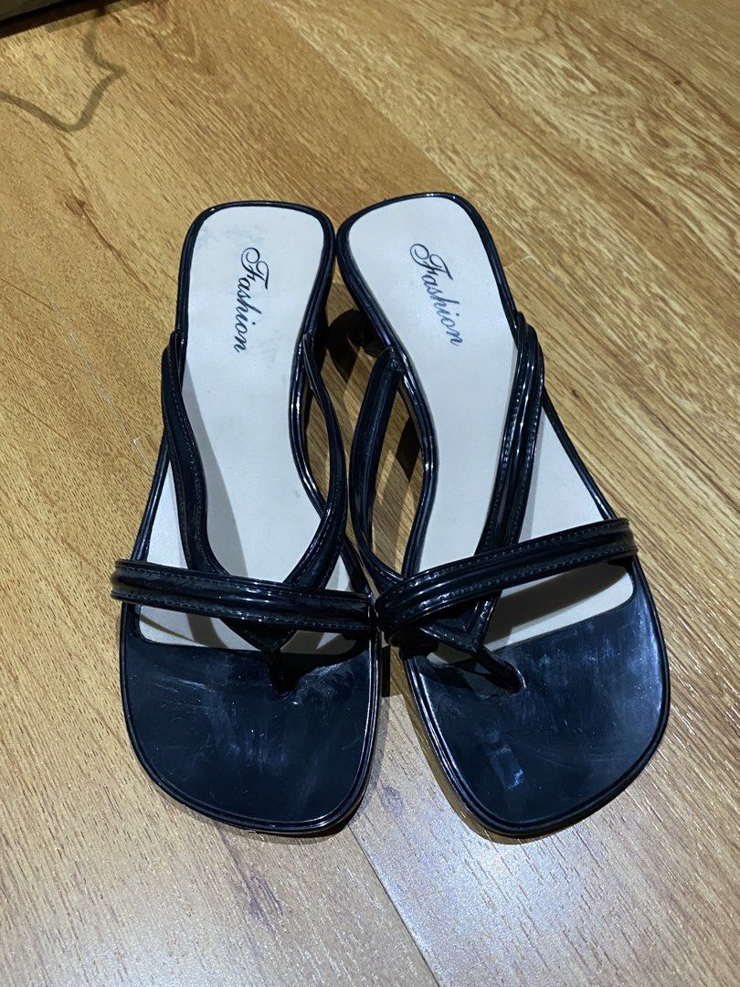 Black block heels sandals size 36 (Category: Heels) located in Manila. Submitted by mpt99876 (Listing ID 1467349785, Image 1). Description: - Style: Black strappy thong sandals with a modern square toe - Heel: Comfortable low chunky block heel for easy, all-day walking - Size: Marked size 36 - Condition: Worn a few times with minimal wear on the bottom tread - Details: Neutral beige insoles featuring clear brand text.