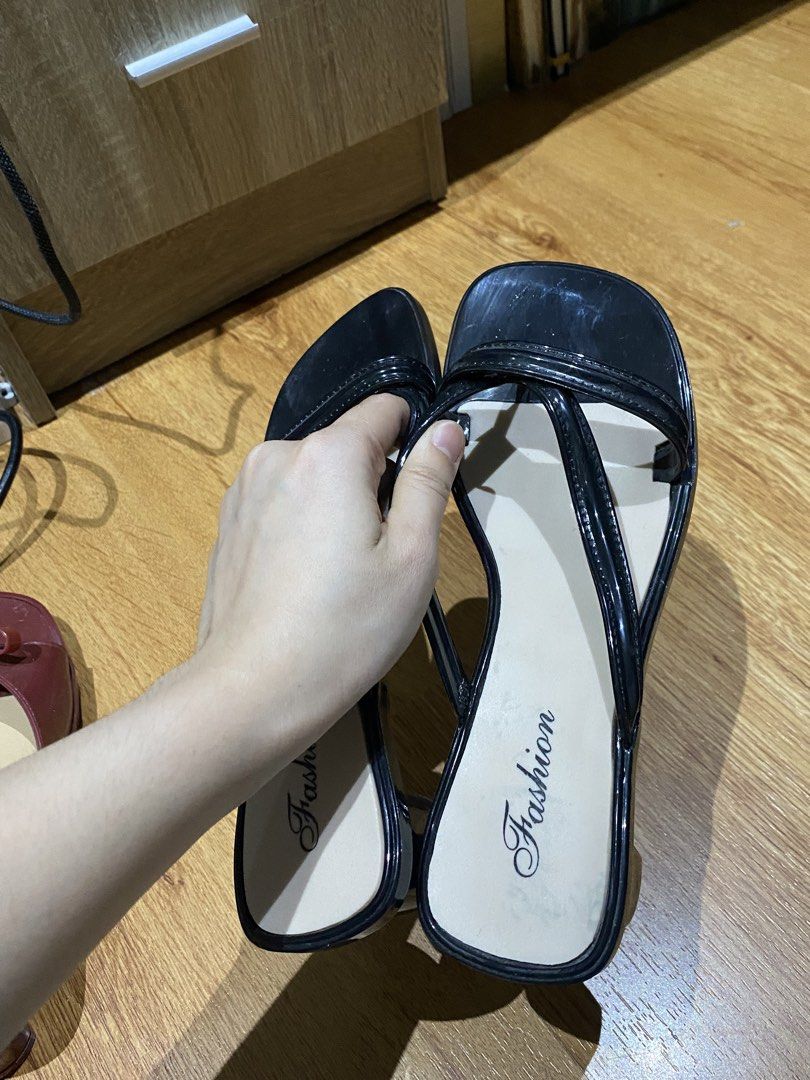 Black block heels sandals size 36 (Category: Heels) located in Manila. Submitted by mpt99876 (Listing ID 1467349785, Image 2). Description: - Style: Black strappy thong sandals with a modern square toe - Heel: Comfortable low chunky block heel for easy, all-day walking - Size: Marked size 36 - Condition: Worn a few times with minimal wear on the bottom tread - Details: Neutral beige insoles featuring clear brand text.