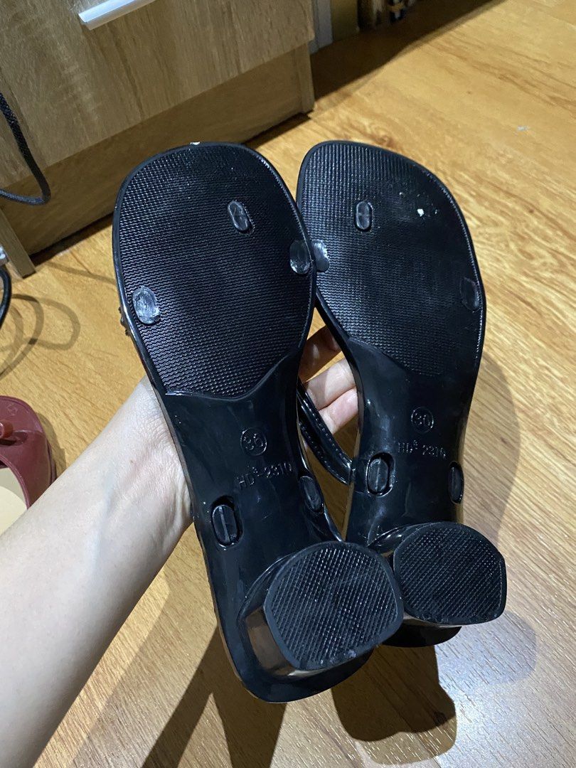Black block heels sandals size 36 (Category: Heels) located in Manila. Submitted by mpt99876 (Listing ID 1467349785, Image 3). Description: - Style: Black strappy thong sandals with a modern square toe - Heel: Comfortable low chunky block heel for easy, all-day walking - Size: Marked size 36 - Condition: Worn a few times with minimal wear on the bottom tread - Details: Neutral beige insoles featuring clear brand text.
