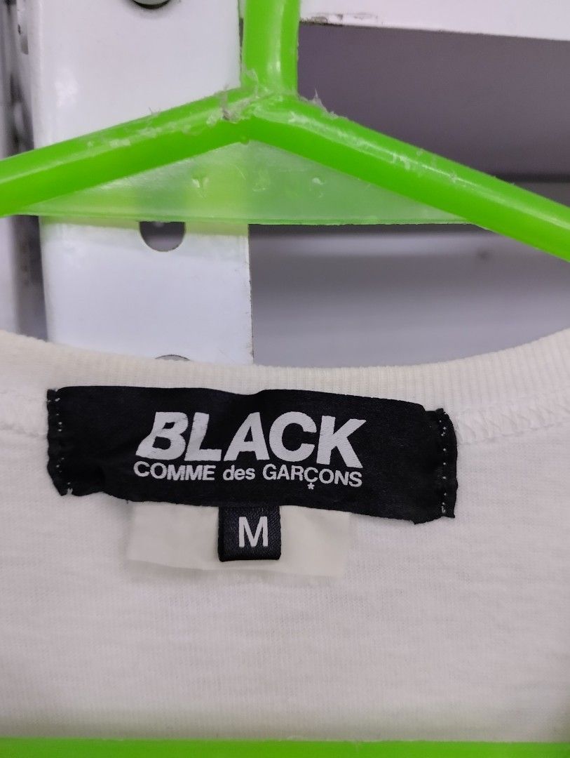 BLACK Comme des Garcons T-Shirt Size M (Category: Shirts) located in Manila. Submitted by niggzreyno51476 (Listing ID 1467219707, Image 2). Description: Authentic BLACK Comme des Garcons white t-shirt in size Medium. Features a bold front graphic, 100% cotton, made in Japan (AD2018 collection). DM for quick shipping! .