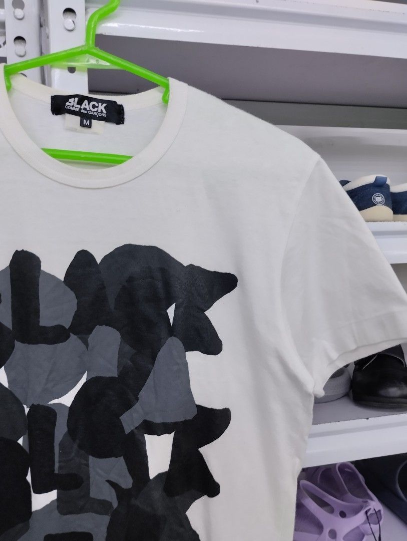 BLACK Comme des Garcons T-Shirt Size M (Category: Shirts) located in Manila. Submitted by niggzreyno51476 (Listing ID 1467219707, Image 1). Description: Authentic BLACK Comme des Garcons white t-shirt in size Medium. Features a bold front graphic, 100% cotton, made in Japan (AD2018 collection). DM for quick shipping! .
