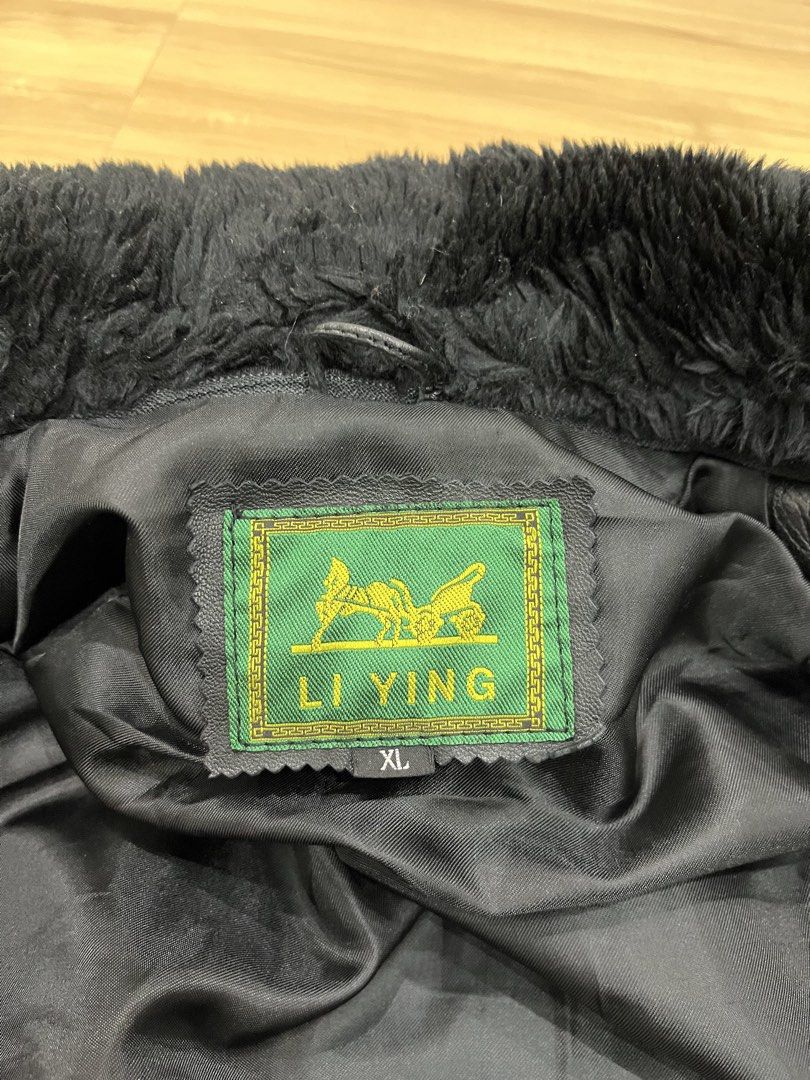 Leather Jacket W Fur (Category: Coats, Jackets and Outerwear) located in Angeles City. Submitted by thriftsij (Listing ID 1467245835, Image 3). Description: - Color: Black - Size: XL 23x29.5 - Features: Detachable black fur collar, front flap pockets, button closures, ribbed hem and cuffs - Style: Classic pilot / heavy-duty winter layer.