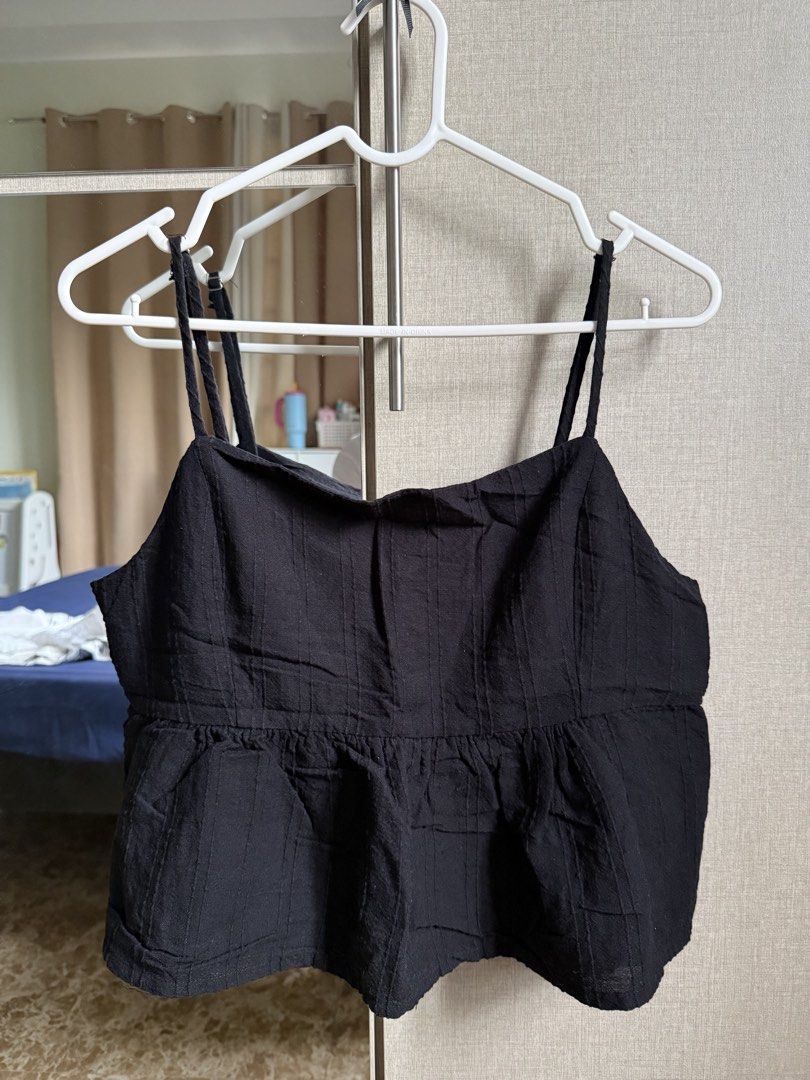 Black Peplum Sleeveless Top (Category: Sleeveless) located in Angeles City. Submitted by decluttering.kimmmyyy (Listing ID 1467234242, Image 1). Description: Black Peplum Sleeveless Top (Straps are adjustable) Brand: Cotton On Size: Medium Condition: Washed but never worn.