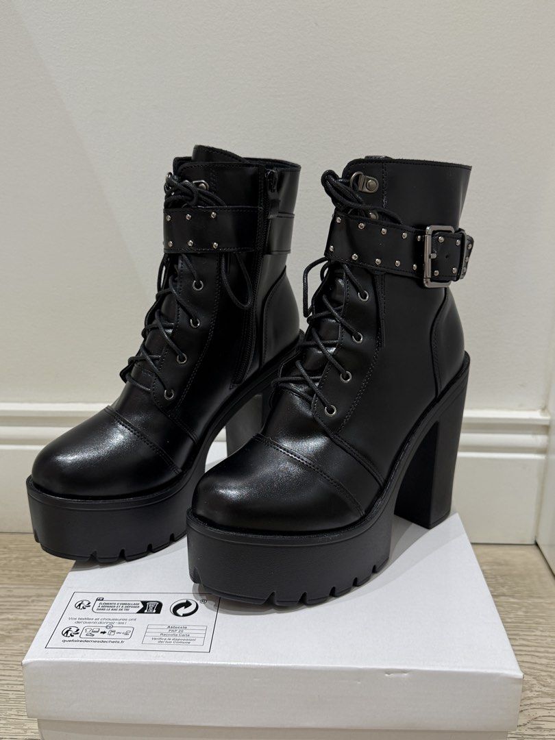 Black Platform Combat Boots with Buckle (Category: Boots) located in Quezon City. Submitted by anneyoung22 (Listing ID 1467253757, Image 2). Description: Like brand new (only worn twice) Women’s EU40 size (can fit Women’s US 9 shoe size) Can request for more photos Location: QC.