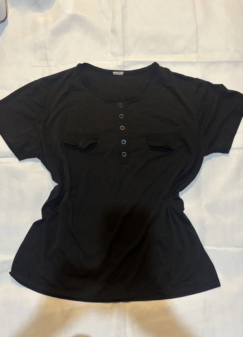 Black Short Sleeve Shirt with Pockets (Category: Tshirts & Polo Shirts ) located in Quezon City. Submitted by cheech.01 (Listing ID 1467267049, Image 1). Description: - Color: Solid Black - Style: Short sleeve henley top with button neckline - Details: Two front chest pockets with button flaps - Fit: Relaxed and comfortable for all-day wear - Fabric: Soft, stretchy material that is easy to match with any casual outfit - Perfect everyday basic ess