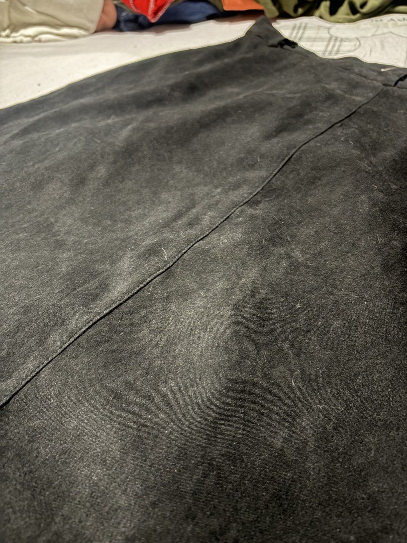 Black suede midi skirt size M with front pockets (Category: Skirts) located in Manila. Submitted by mcllts (Listing ID 1467344151, Image 2). Description: - Color: Black - Length: Midi - Material: Soft suede fabric with full lining - Size: M - Features: Structured waistband with belt loops, front button-flap utility pockets, and centered vertical front seam - Condition: Excellent NOTE: You can buy 2 other items and get 5% discounts.