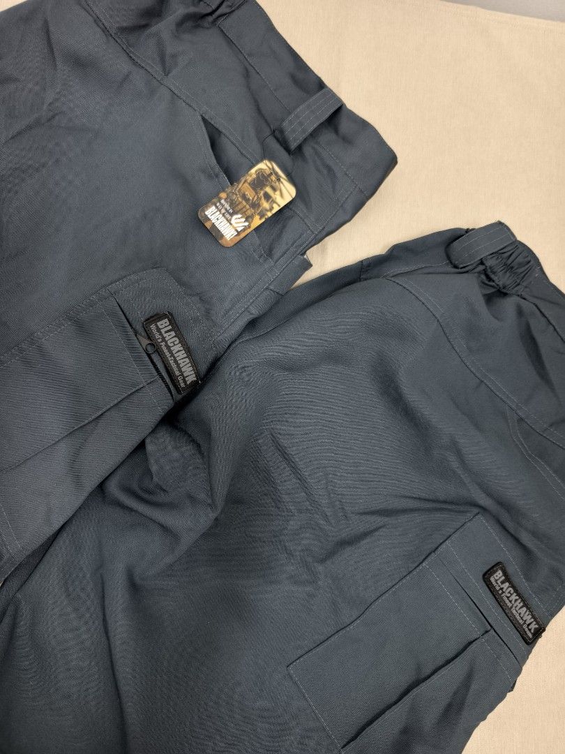 Blackhawk Tactical Cargo Pants Dark Grey (Category: Trousers) located in Angeles City. Submitted by measaliman02351 (Listing ID 1467275813, Image 3). Description: Authentic Blackhawk dark grey tactical cargo pants. Durable, features multiple pockets, belt loops, and an elastic waistband. Brand new with tags attached, perfect for outdoor activities or work. SIZE 42.