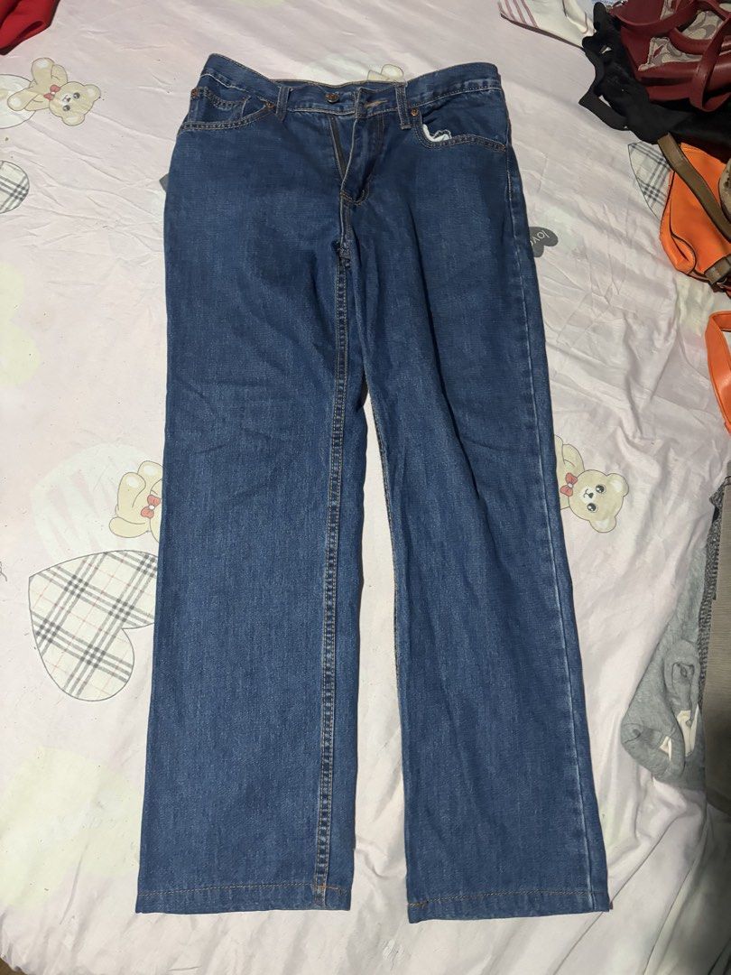 Blue Denim Jeans Size 28 (Category: Jeans) located in Manila. Submitted by mcllts (Listing ID 1467349101, Image 1). Description: - Size: 28 (tagged with interior logo) - Style: Classic straight leg with traditional 5-pocket design - Wash: Medium blue with contrast stitching - Closure: Standard front button and zipper fly - Condition: Well-maintained, versatile everyday wear.