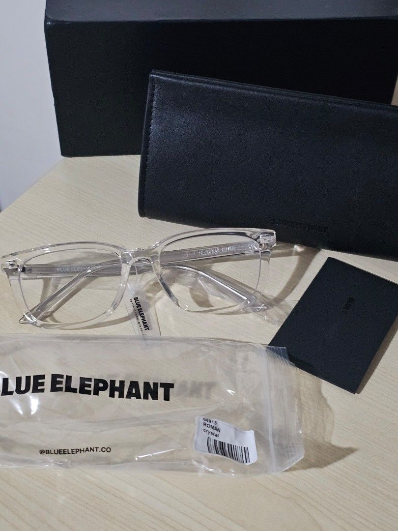 Blue Elephant Roman Crystal Glasses (Category: Sunglasses & Eyewear) located in Paranaque City. Submitted by mab.villareal (Listing ID 1467286227, Image 3). Description: Blue Elephant Roman glasses in crystal. Includes original black case, branded outer box, tags, and packaging bag. Unworn condition, still wrapped up. RFS: overhoarded. extra pair.