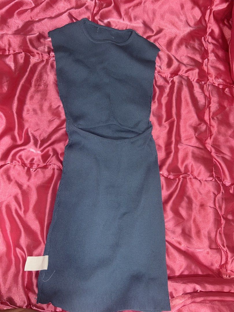Blue Ribbed Cutout Dress (Category: Dresses) located in Manila. Submitted by axlrose.17 (Listing ID 1467273453, Image 1). Description: - Color: Dark blue - Style: Sleeveless midi dress with a trendy waist cutout - Fit: Super fitted, body-hugging silhouette - Fabric: Comfortable, stretchy ribbed knit - Condition: Brand new with tag still attached - Versatility: Great for casual wear or going out.