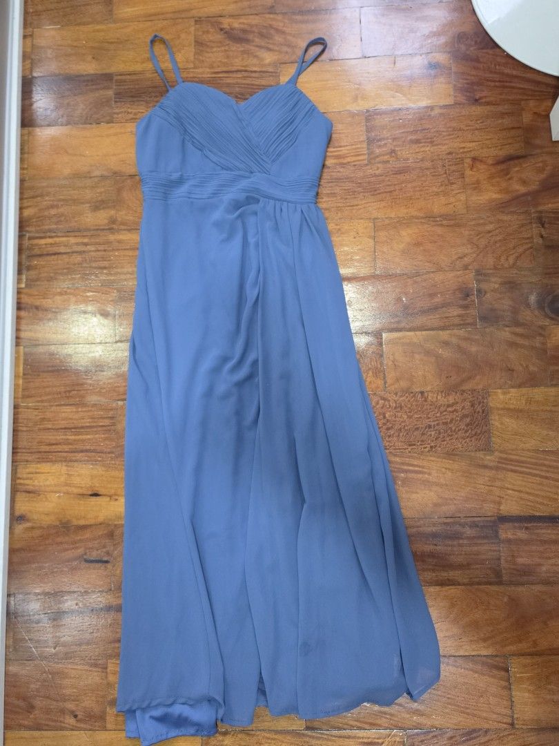 Blue Spaghetti Strap Maxi Dress (Category: Dresses) located in Quezon City. Submitted by milletannn86935 (Listing ID 1467252568, Image 1). Description: - Color: blue - Material: Lightweight chiffon - Design: Sweetheart neckline with pleated bodice, spaghetti straps, and flowy layered skirt - Length: below knee-length - Condition: Worn once, dry-cleaned, and ready to wear - Ideal for: Weddings, parties, and formal events.