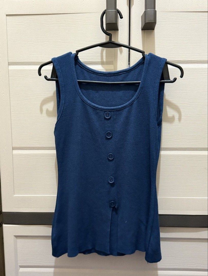 Blue Square Neck Button Front Tank Top (Category: Sleeveless) located in Bocaue. Submitted by pat.staines (Listing ID 1467220320, Image 1). Description: - Color: Blue - Style: Sleeveless top with square neckline and front button placket - Fit: Soft, stretchy knit fabric that hugs the body .