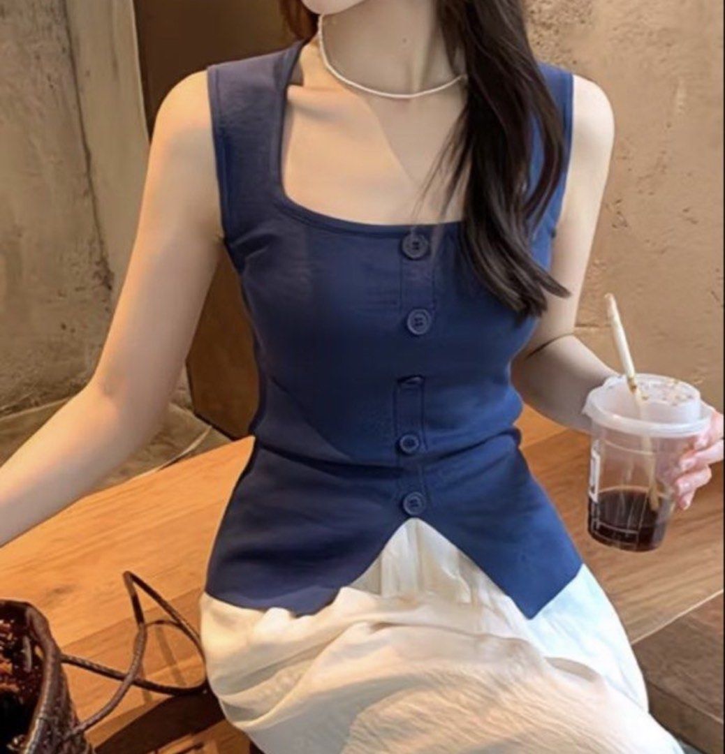 Blue Square Neck Button Front Tank Top (Category: Sleeveless) located in Bocaue. Submitted by pat.staines (Listing ID 1467220320, Image 2). Description: - Color: Blue - Style: Sleeveless top with square neckline and front button placket - Fit: Soft, stretchy knit fabric that hugs the body .