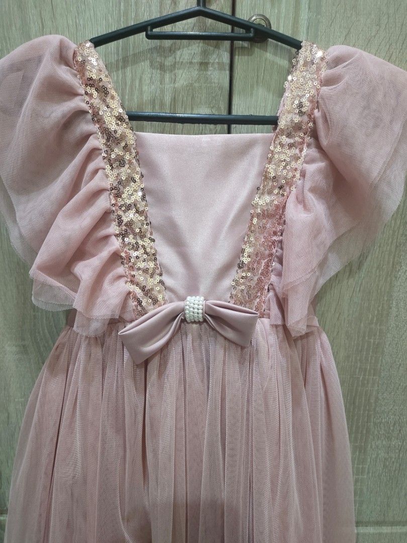 Blush Pink Sequined Soft Tulle Dress (Category: Babies & Kids Fashion) located in Paranaque City. Submitted by expectmore.payless (Listing ID 1467357657, Image 2). Description: Nanno Kids Brand from SM Dept Store Size 8 but used by my daughter at 5 years old with an issue pls see pic color may vary actual dress is lighter in actual.