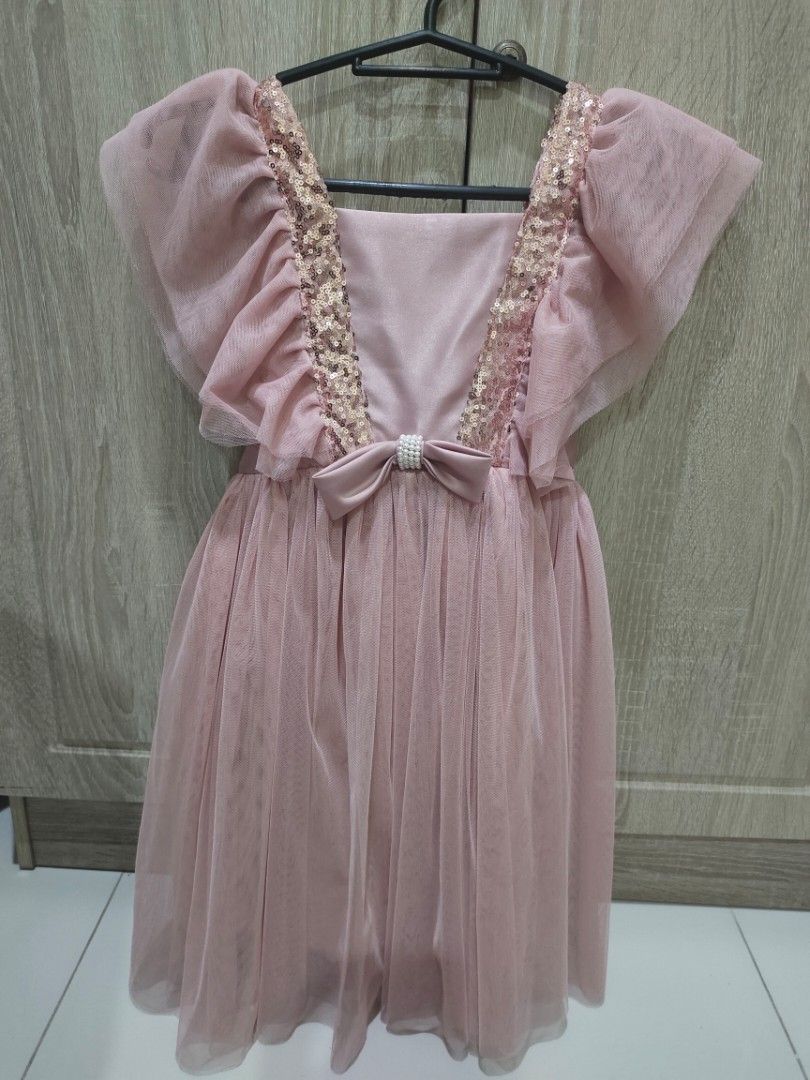 Blush Pink Sequined Soft Tulle Dress (Category: Babies & Kids Fashion) located in Paranaque City. Submitted by expectmore.payless (Listing ID 1467357657, Image 1). Description: Nanno Kids Brand from SM Dept Store Size 8 but used by my daughter at 5 years old with an issue pls see pic color may vary actual dress is lighter in actual.