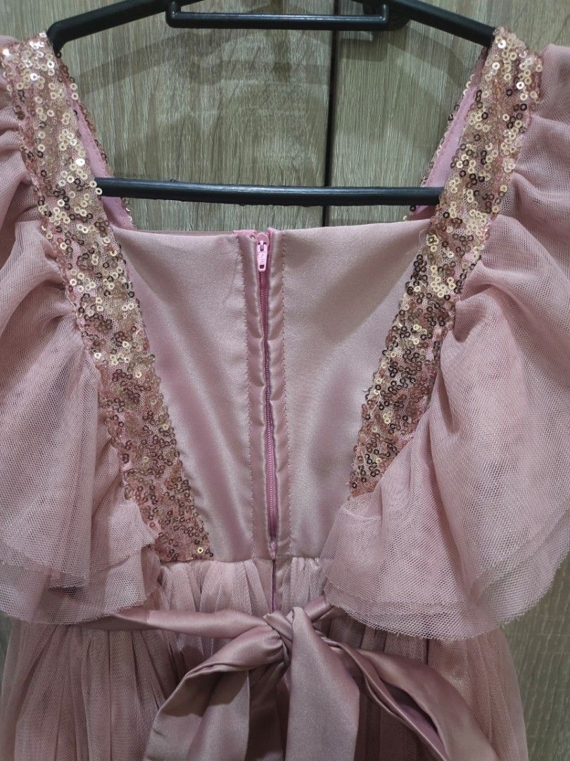 Blush Pink Sequined Soft Tulle Dress (Category: Babies & Kids Fashion) located in Paranaque City. Submitted by expectmore.payless (Listing ID 1467357657, Image 3). Description: Nanno Kids Brand from SM Dept Store Size 8 but used by my daughter at 5 years old with an issue pls see pic color may vary actual dress is lighter in actual.