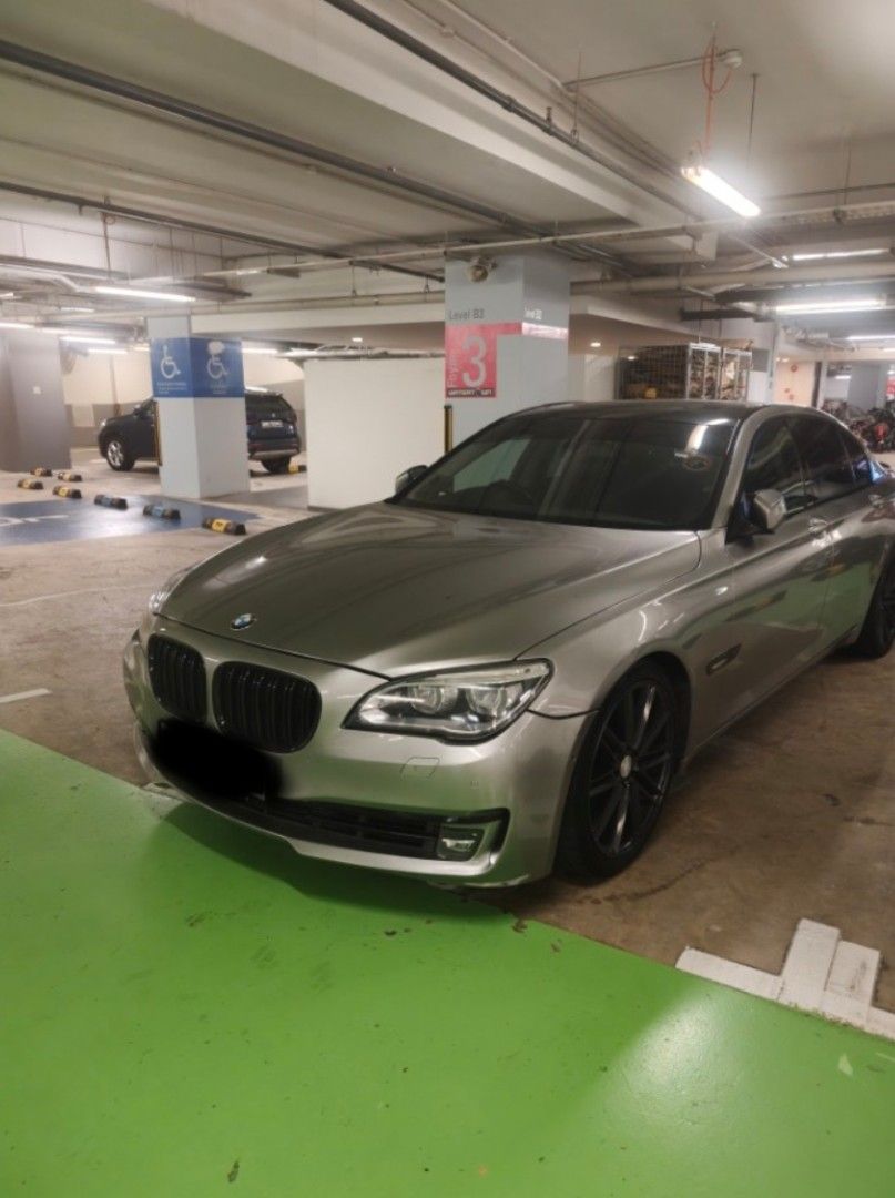 BMW 7 Series 740Li (A) (Category: Used Cars) located in Singapore. Submitted by ferrechan.480 (Listing ID 1445058688, Image 1). Description: Silver BMW 7 Series sedan. Black rims. Tinted windows. Located in a parking garage. Ready for a new owner. Purchased with nothing to repair. receipt upon viewing.
