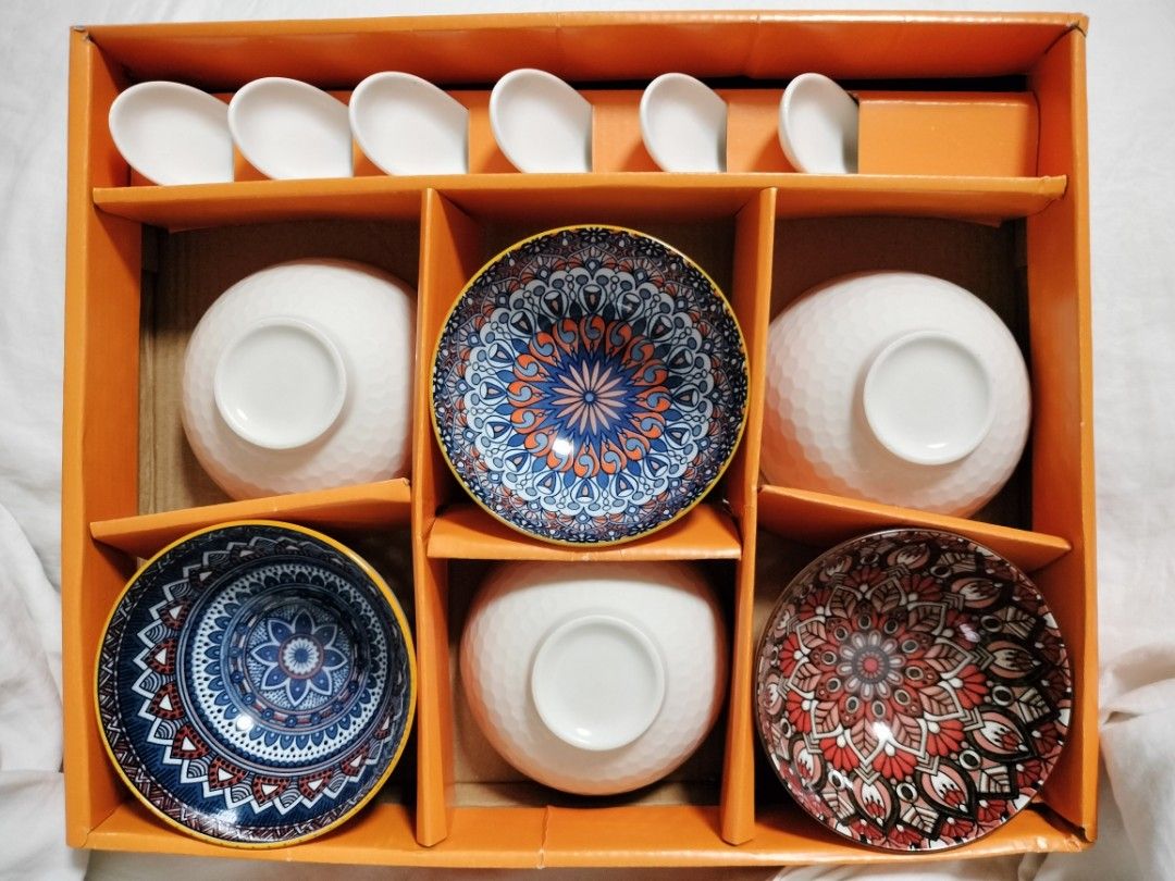 Bohemia Geometric Design Ceramic Bowl and Spoon Set (Category: Dinnerware & Cutlery) located in San Mateo. Submitted by shop_with_nicer (Listing ID 1467188539, Image 3). Description: - Bohemia geometric design ceramic tableware set - Includes 6 colorful mandala-printed bowls and 6 matching spoons - Vibrant blue, red, orange, and white tones - Neatly packed in a matching gift bag with rope handles - Ideal housewarming gift or dining table upgrade.