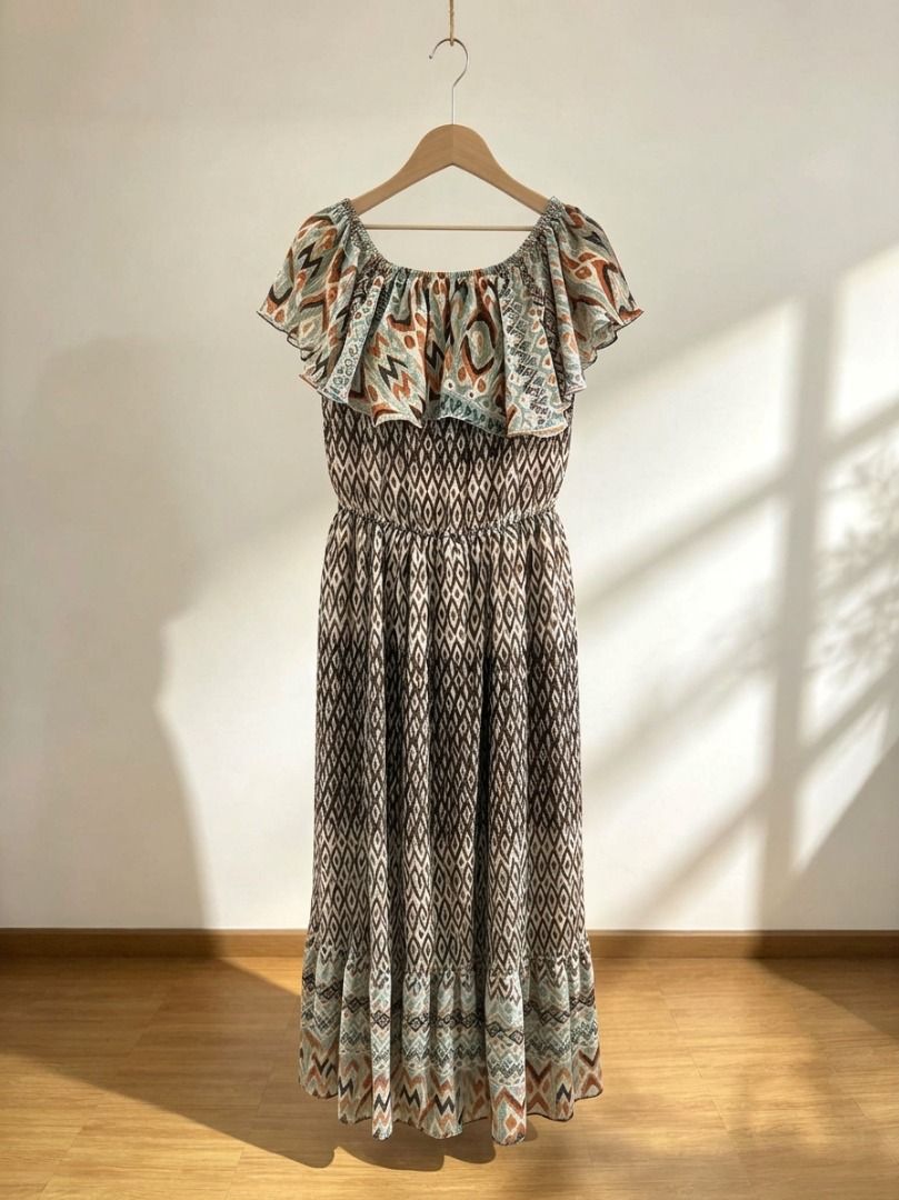 Boho Maxi Dress Geometric Pattern Off Shoulder Ruffle Tiered (Category: Dresses) located in Manila. Submitted by meedclothing (Listing ID 1467314791, Image 1). Description: - Style: Boho maxi dress with vibrant geometric print - Fit: Comfortable smocked bodice and easy slip-on design (no zippers) - Design: Off-shoulder neckline with wide ruffle overlay - Skirt: Long, lightweight tiered skirt with a matching patterned hem 📌 PLEASE READ BEFORE ORD