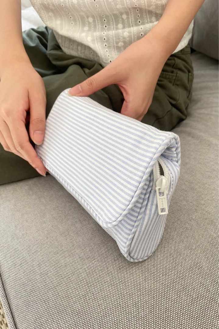 Brandy Melville Light Blue Stripes Makeup Bag (Category: Purses & Pouches) located in Quezon City. Submitted by elaine.p25 (Listing ID 1467246213, Image 2). Description: onhand bought from tokyo.