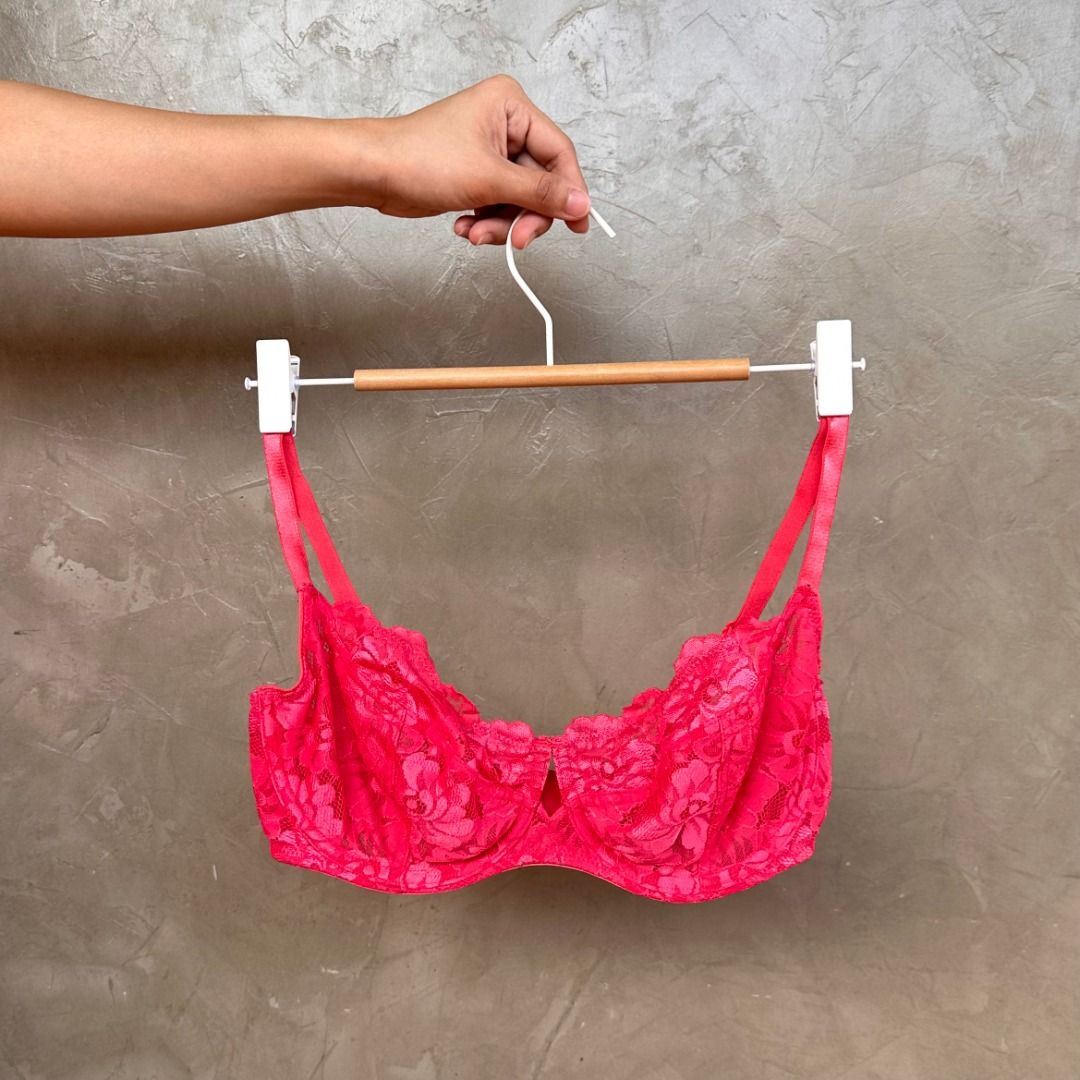 Bright Pink Lace Underwire Bra (Category: Undergarments & Loungewear) located in Balanga. Submitted by manitidiana (Listing ID 1467312155, Image 1). Description: - Color: Bright pink - Type: Unlined lace bra with underwire support - Straps: Adjustable double straps on each side - Details: Scalloped trim and vibrant floral lace fabric - Closure: Back hook-and-eye closure.