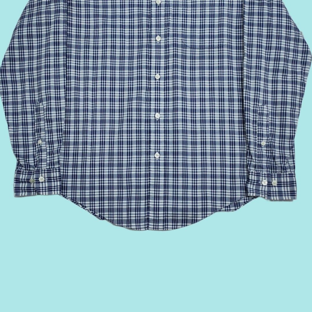 Brooks Brothers Regent Plaid Button-Down Shirt (Category: Formal Shirts) located in Tarlac. Submitted by senkustuff (Listing ID 1467314136, Image 3). Description: - Brand: Brooks Brothers - Size: Medium (Regent Fit) - Pattern: Classic blue and white plaid - Material: 100% Cotton with fabric woven in Italy - Features: Button-down collar, single chest pocket, and adjustable button cuffs - Condition: Excellent, clean, and sharp look for smart-casual