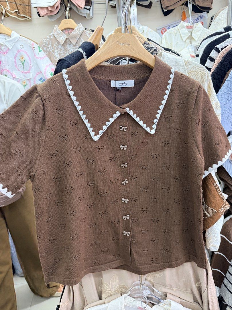 Brown knitted blouse (Category: Blouses) located in Quezon City. Submitted by ayielovesz (Listing ID 1467313367, Image 1). Description: bought from bangkok knitted and good quality large size but kinda short in length.