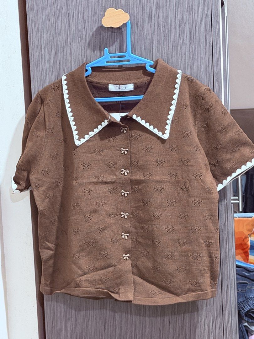 Brown knitted blouse (Category: Blouses) located in Quezon City. Submitted by ayielovesz (Listing ID 1467313367, Image 2). Description: bought from bangkok knitted and good quality large size but kinda short in length.