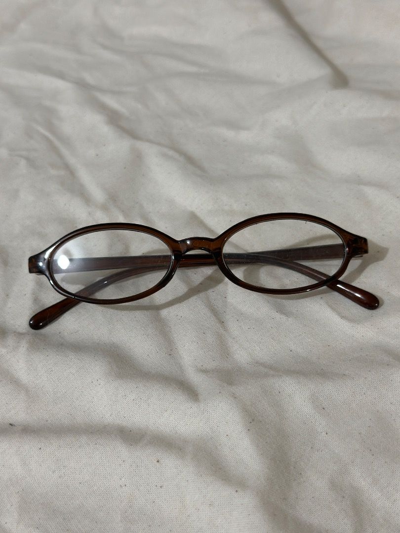 Brown Oval Frame Glasses Reading Glasses (Category: Sunglasses & Eyewear) located in Mandaluyong City. Submitted by lovedbyjaaaam (Listing ID 1467279889, Image 1). Description: - Style: Brown oval frames with a stylish tortoise-style pattern - Lenses: Clear, clean condition with no major scratches - Comfort: Lightweight build with comfortable temples for all-day wear - Fit: Standard fit, perfect for daily use or blue light blocking.