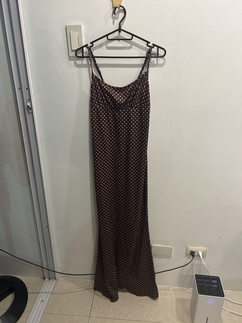 Brown Polka Dot Maxi Slip Dress (Category: Dresses) located in Manila. Submitted by lorasworld (Listing ID 1467258065, Image 1). Description: - Color & Pattern: Brown with white polka dots - Style: Midi slip dress with scoop neckline and ruched chest - Straps: Adjustable spaghetti straps with a chic double-strap back design.