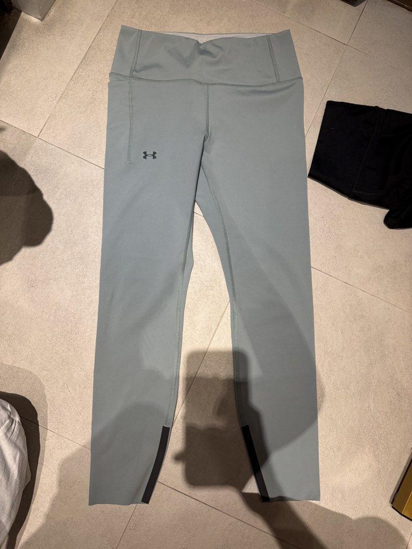 BUNDLE Under Armour Celliant and Compression Leggings Size M (Category: Activewear) located in Makati City. Submitted by rockandraw (Listing ID 1467226016, Image 1). Description: - Brand: Under Armour - Quantity: 2 pairs of leggings - Size: Medium - Grey Pair: Powered by Celliant technology, made in Jordan - Black Pair: Compression fit, made in Vietnam - Features: Waistbands with printed branding and interior size info - Ideal for: Workouts, runn