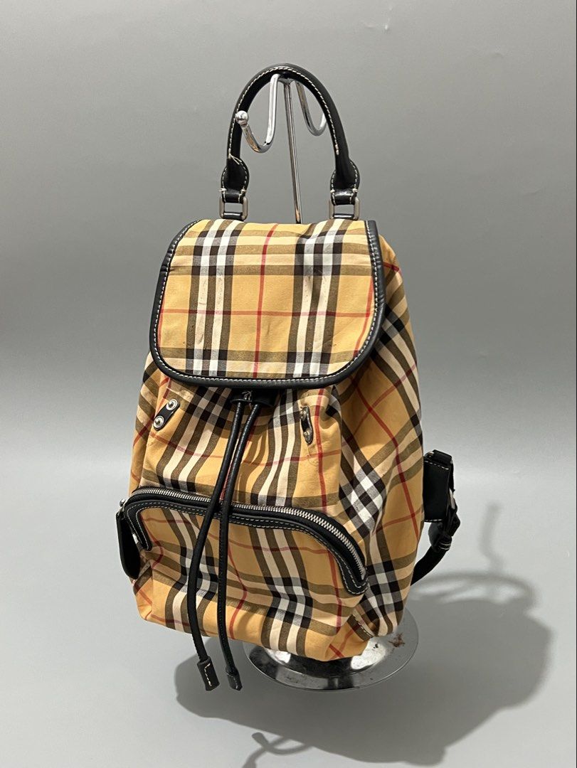 BURBERRY - Nova Plaid - Backpack (Category: Backpacks) located in Cavite. Submitted by asianluxe (Listing ID 1467268388, Image 2). Description: BURBERRY - NOVA PLAID - BACKPACK Measurements! Length:12 inches Width:14 inches Depth: 6 inches Good condition Very presentable 9/10 condition Missing lock! If u interested, Drop your offer , Let’s negotiate.