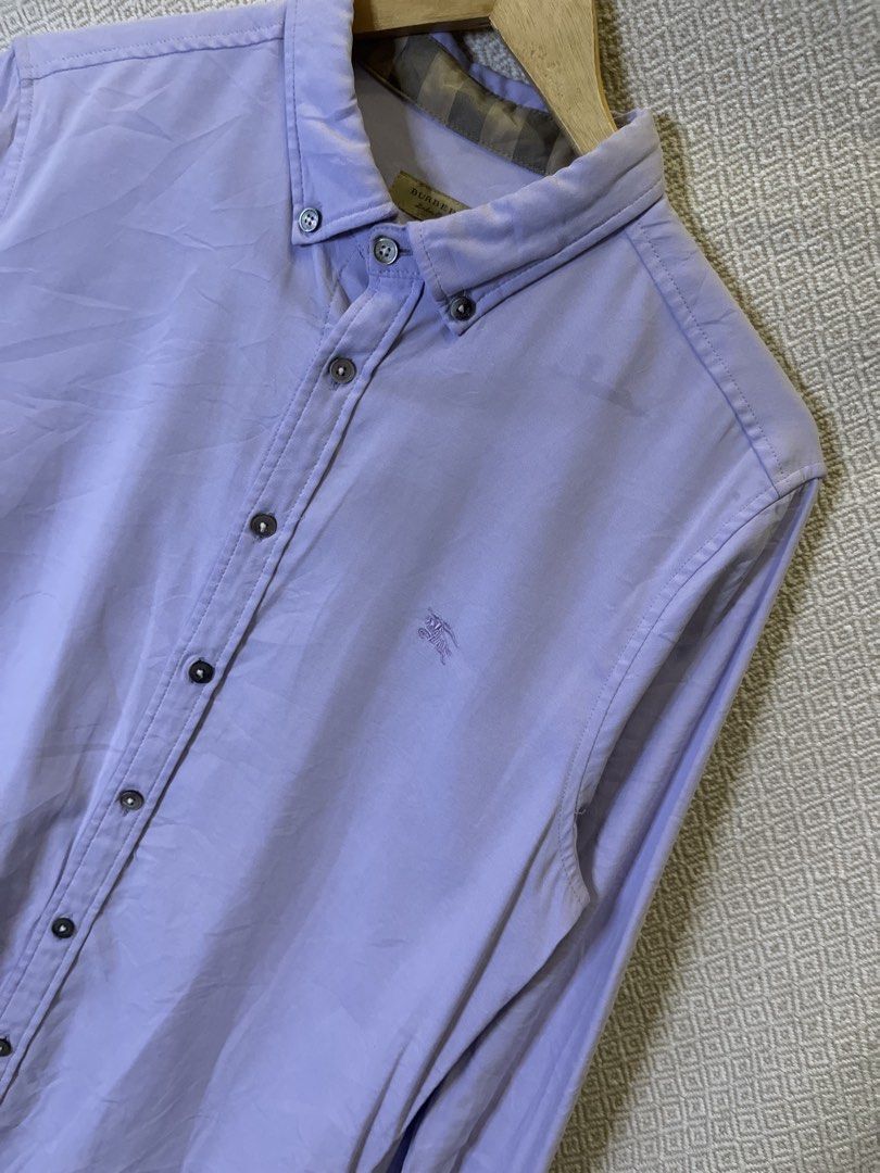 Burberry button down polo long sleeve (Category: Tshirts & Polo Shirts ) located in Manila. Submitted by hypestock_mnl (Listing ID 1467225510, Image 2). Description: - stylish - perfect for casual wear - great fit - in good condition - minimal signs of usage - 9/10 - money worth! - see pics for details/issue.