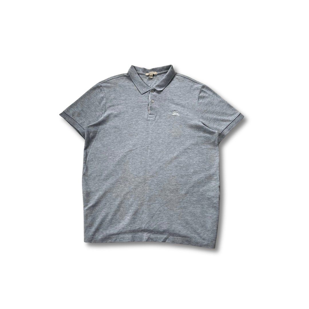 Burberry Polo Shirt (Category: Tshirts & Polo Shirts ) located in Panabo. Submitted by curated.dept (Listing ID 1467275389, Image 1). Description: Burberry Polo Shirt size medium to large 22 width, 28 length excellent condition 9/10 color rate minimal unnoticeable stain on shoulder no major flaws PRICE: ₱1400 free shipping.