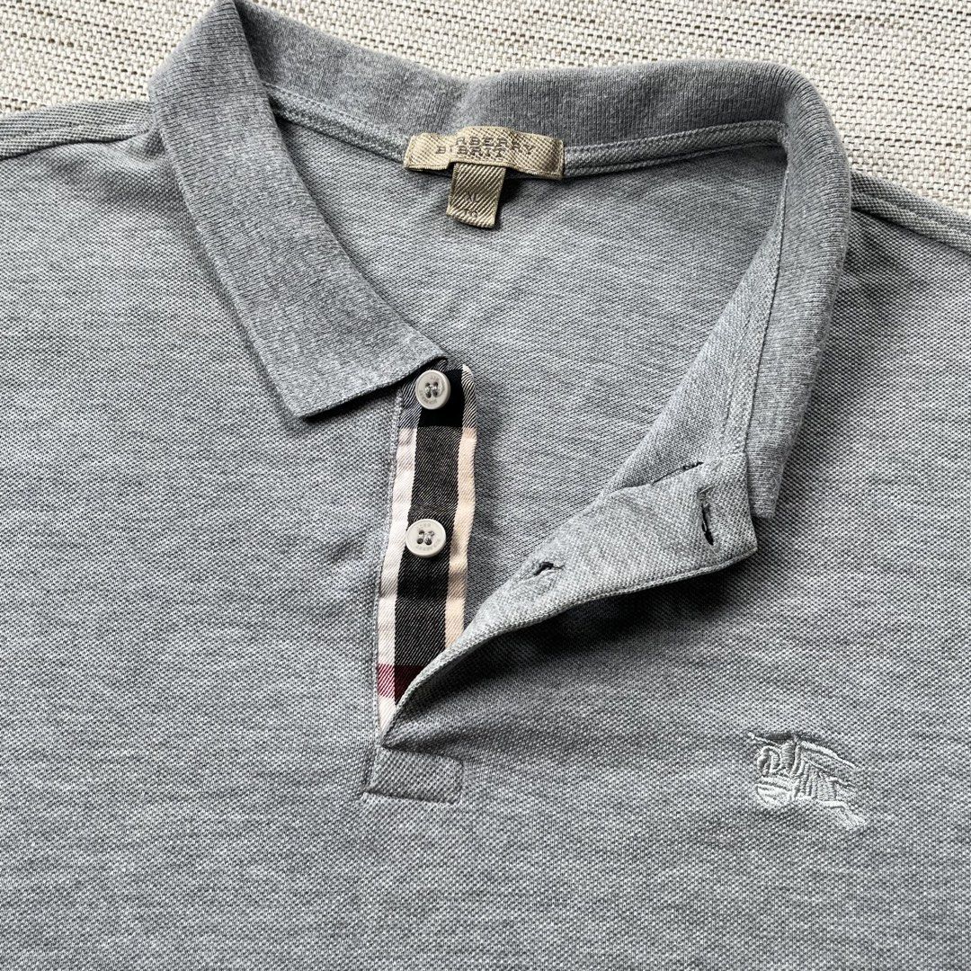 Burberry Polo Shirt (Category: Tshirts & Polo Shirts ) located in Panabo. Submitted by curated.dept (Listing ID 1467275389, Image 2). Description: Burberry Polo Shirt size medium to large 22 width, 28 length excellent condition 9/10 color rate minimal unnoticeable stain on shoulder no major flaws PRICE: ₱1400 free shipping.