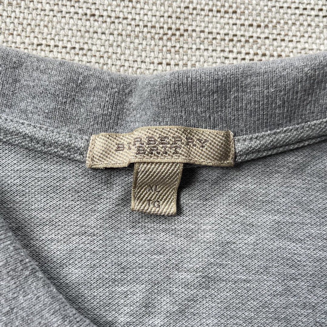 Burberry Polo Shirt (Category: Tshirts & Polo Shirts ) located in Panabo. Submitted by curated.dept (Listing ID 1467275389, Image 3). Description: Burberry Polo Shirt size medium to large 22 width, 28 length excellent condition 9/10 color rate minimal unnoticeable stain on shoulder no major flaws PRICE: ₱1400 free shipping.