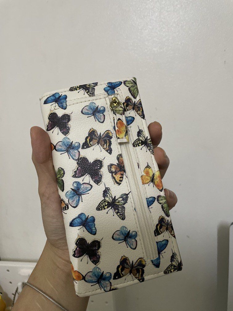 Butterfly Mundi long wallet RFID safe (Category: Wallets & Card holders) located in Bacolor. Submitted by louiviellefinds (Listing ID 1467248617, Image 2). Description: Your credit cards/debit cards are safe when you use this .