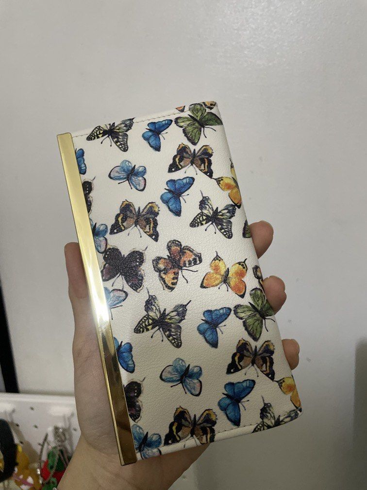 Butterfly Mundi long wallet RFID safe (Category: Wallets & Card holders) located in Bacolor. Submitted by louiviellefinds (Listing ID 1467248617, Image 1). Description: Your credit cards/debit cards are safe when you use this .