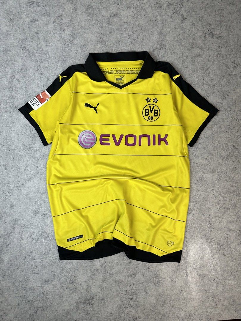 BVB PUMA Yellow Kit Jersey (Category: Tshirts & Polo Shirts ) located in Batangas. Submitted by geejay2ph (Listing ID 1467299300, Image 3). Description: ʙʀᴀɴᴅ: BVB PUMA Yellow Kit Jersey sɪᴢᴇ: Large on Tag ; Neck to Bottom Length (28) in. Pit-Pit Width (22) in. ᴄᴏɴᴅɪᴛɪᴏɴs: Cracks On Back Print, But Stil in Excellent Condition.