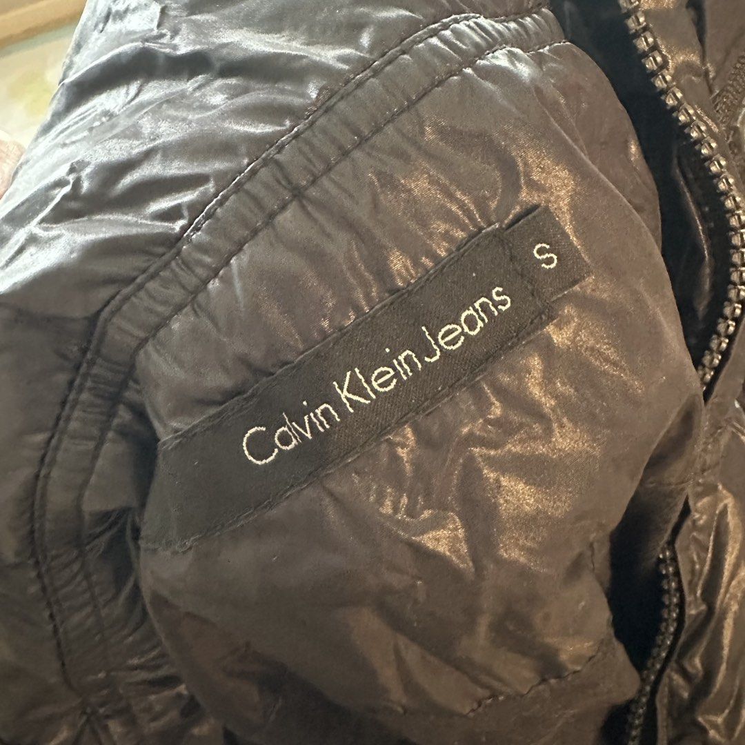 Calvin Klein black utility bomber jacket (Category: Coats, Jackets and Outerwear) located in Pasig City. Submitted by ynahperez (Listing ID 1467305125, Image 2). Description: .