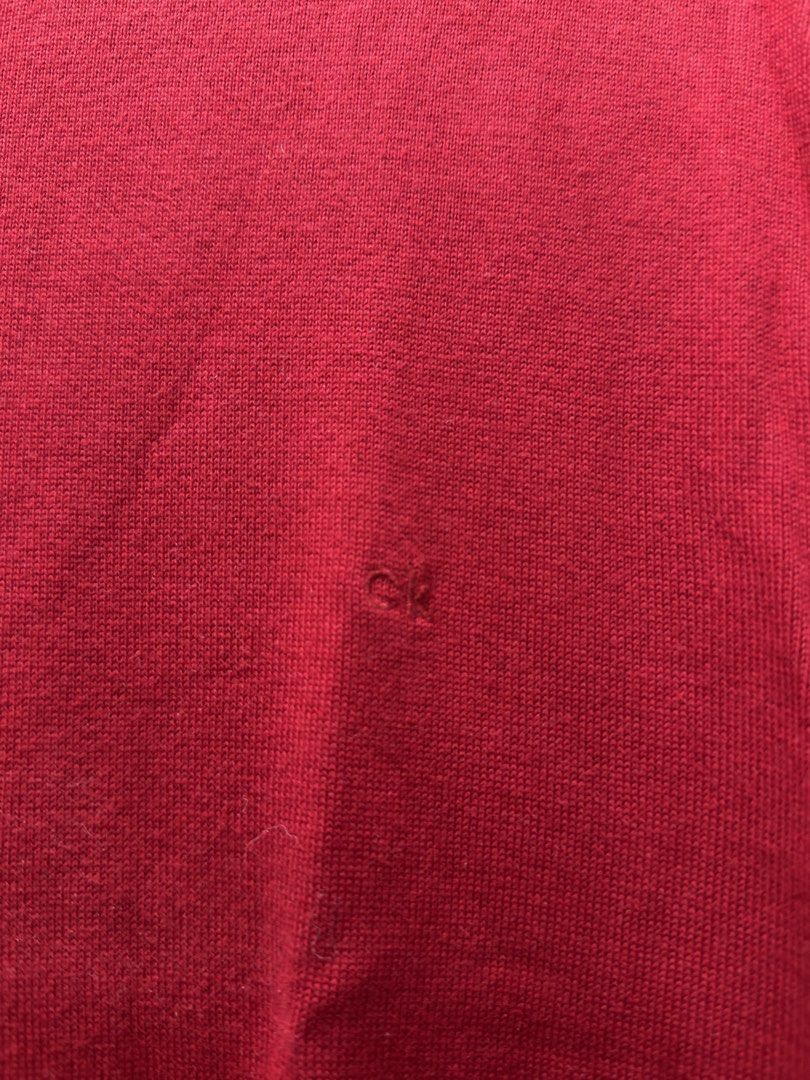 Calvin Klein Red Supima Cotton Sweater (Category: Coats, Jackets and Outerwear) located in Bacoor. Submitted by preloved_with_love_ (Listing ID 1467192781, Image 3). Description: Dimension: W 20in L 29in - Brand: Calvin Klein - Color: Dark Red - Size: Medium (True to size) - Material: 100% Supima cotton (lightweight and super soft) - Design: Long sleeves, ribbed cuffs and hem, subtle tonal embroidered CK logo on chest - Care: Machine washable - C