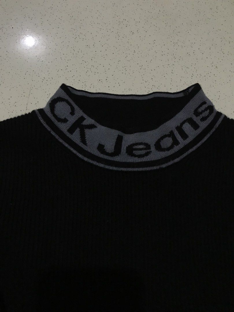 Calvin Klein Ribbed Black Sweater (Category: Longsleeves) located in Antipolo. Submitted by roxy.xy (Listing ID 1467320059, Image 3). Description: - Brand: Calvin Klein Jeans - Bought from 🇺🇸 - Style: Ribbed long sleeve sweater with mock neck - Size: XS (Slim fit) - Material: Soft, comfortable knit fabric.