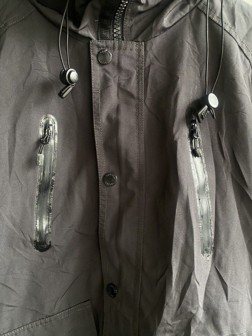 Canada Goose Arctic Program Hooded Jacket Dark Grey (Category: Coats, Jackets and Outerwear) located in Manila. Submitted by anthony1723 (Listing ID 1467193497, Image 3). Description: - Authentic Canada Goose Arctic Program hooded jacket in dark grey - Full zip closure with snap-button storm flap and adjustable drawstrings - Dual zipped chest pockets and dual front flap pockets - Iconic circular embroidered patch on the left sleeve and brand labe