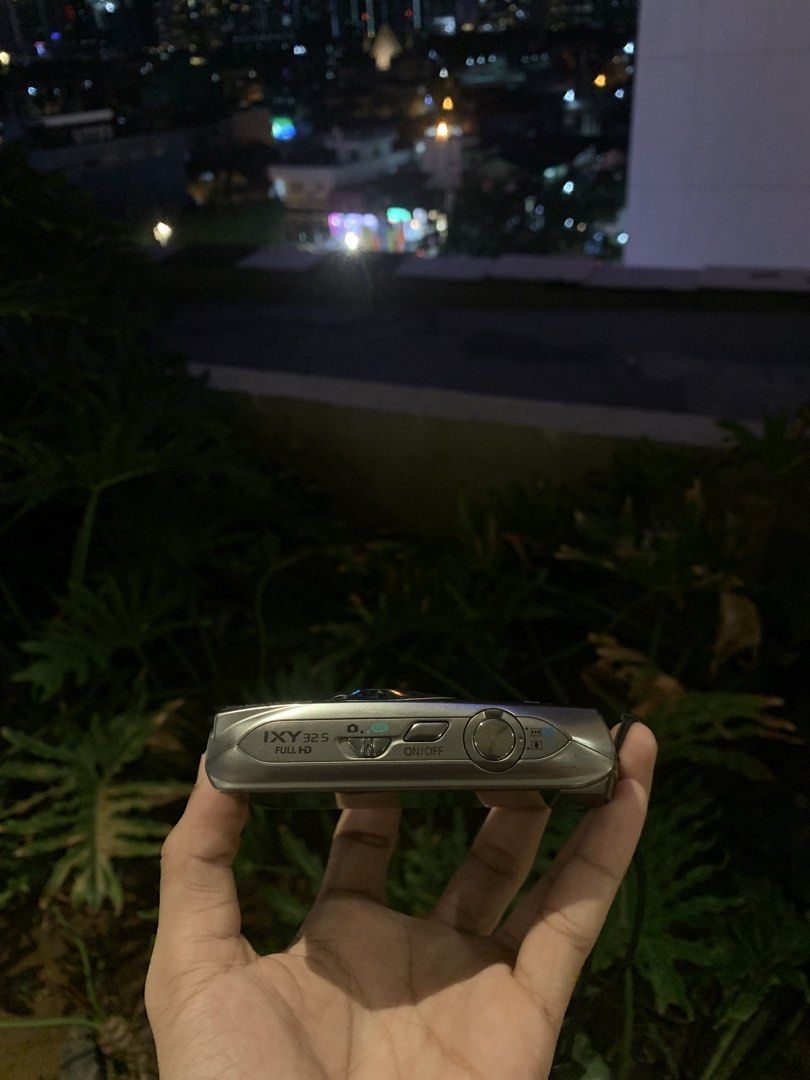 Canon IXY 31S (Category: Cameras) located in Manila. Submitted by gudthriftby.la (Listing ID 1467224660, Image 3). Description: Digital Camera Model: Canon IXY 31S 12.1MP • 4.4x Optical Zoom 3.2” Touchscreen LCD • Full HD 1080p Video 100% Fully working camera. Issue: None — ₱3,199 negotiable( No memory card included. ) MOP: GCASH / MOD: J&T & LBC 🚚 Located: Sta Ana Manila, Philippines 🇵🇭 DM TO PURCHASE! 📩.
