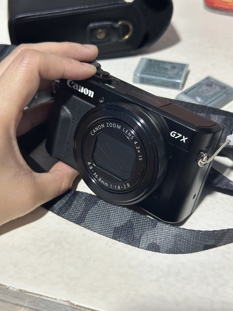 Canon PowerShot G7 X II (Category: Cameras) located in Meycauayan. Submitted by stld027 (Listing ID 1467234700, Image 3). Description: 📸 FOR SALE: Canon G7X Mark II Selling my personal Canon G7X Mark II! Used only during travels and well-loved. Inclusions: * Original box * Original charger * 2 original batteries * Silicone case * Mini camera bag * Originally purchased from Henry’s Cameras, SM Mall of Asia (MOA). 📸 Reason for selling: Upgrading 