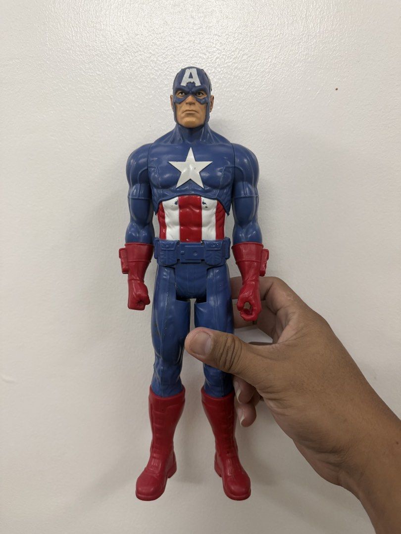 Captain America Action Figure (Category: Figurines & Statues) located in Lipa City. Submitted by cokelight11 (Listing ID 1467314941, Image 2). Description: Captain America Action Figure Classic piece Hasbro dated 2013 Issue:Minimal paint chipping on the helmet and chest Joints are tight Great addition for any Marvel fan or kids' toy collection.