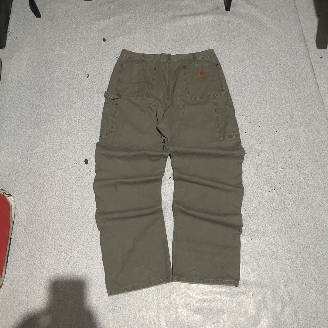 Carharrt Dknee B136-MOS (Category: Jeans) located in Manila. Submitted by juniorthrift (Listing ID 1467304833, Image 1). Description: Carharrt Dknee B136-MOS Excellent condition Dimes Width - 34-32 Length - 42 Open Leg - 9.5 .
