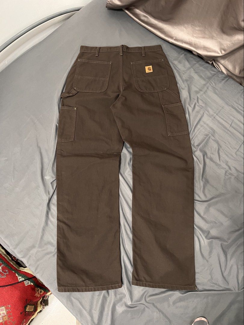 Carhartt B136 DKB Double Knee Pants (Category: Jeans) located in Quezon City. Submitted by puresnow111 (Listing ID 1467193683, Image 2). Description: WTS/FS: Carhartt B136 DKB Double Knee Pants - Size: 32x32 on tag - Actual Dimes: W33 x L45 x H9.5 - Condition: As new/Excellent Condition - Issue: Small Cut on Hem part but not altered (See pics) .