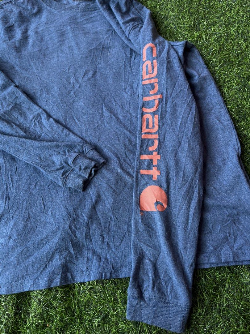 CARHARTT LONGSLEEVE SPELLOUT (Category: Coats, Jackets and Outerwear) located in Carcar. Submitted by thrift_kidd (Listing ID 1467185641, Image 3). Description: Medium fit Small on tag Dimes: 20x26 Excellent Condition DM ME TO PURCHASE 📩 .