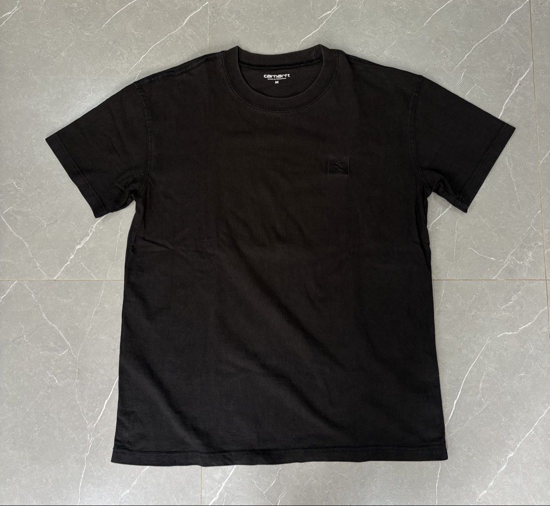 Carhartt WIP Black T-Shirt Medium (Category: Tshirts & Polo Shirts ) located in General Trias. Submitted by charleslrnz (Listing ID 1467211109, Image 1). Description: - Brand/Model: Carhartt Work In Progress (WIP) Tee - Color: Classic Black - Size: Medium (fits true to size) - Details: Crew neckline, short sleeves, embroidered chest logo patch - Material: Comfortable cotton blend - Origin: Made in Cambodia - Style: Versatile everyday streetwear e